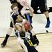 Michigan sophomore Trey Burke is heavily defended in the first half of the game against South Dakota State on Thursday, March 21. Daniel Brenner I AnnArbor.com